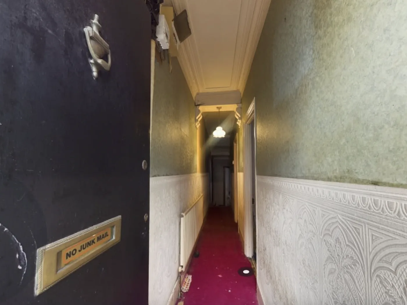 Entrance hall before the works