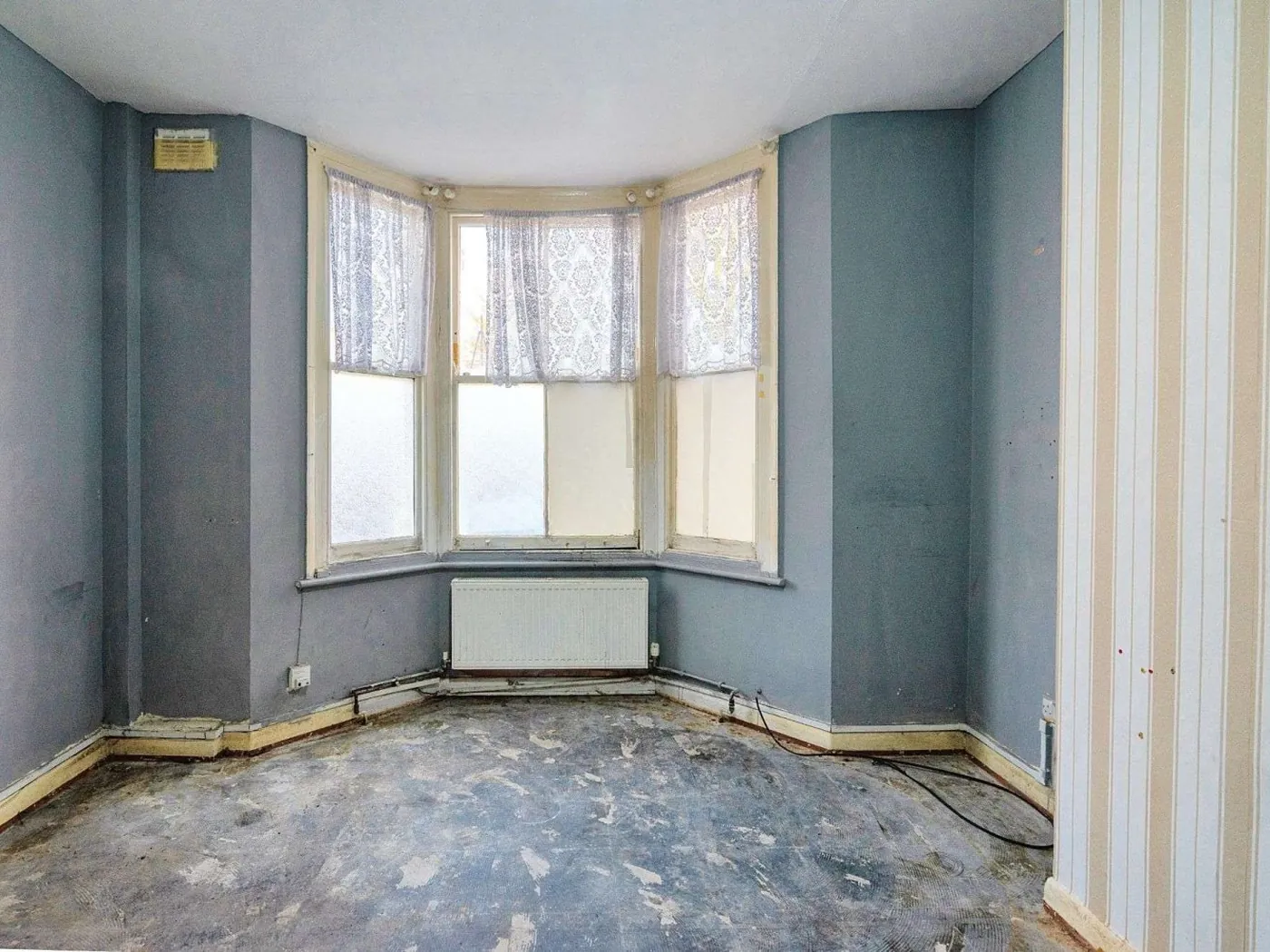 Front reception room before the works